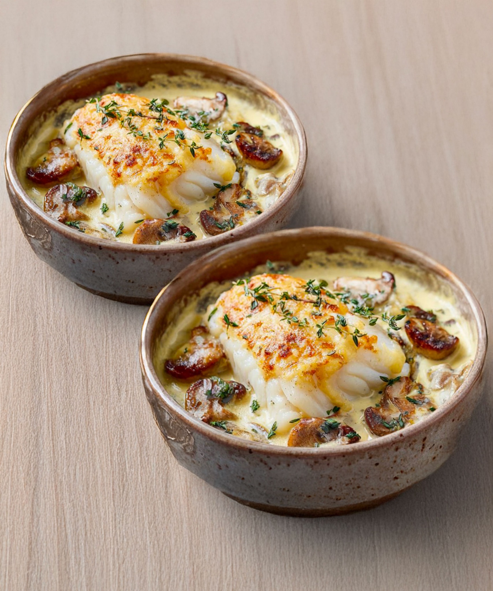 Kabeljauwfilet ovenschotel met room en champignons