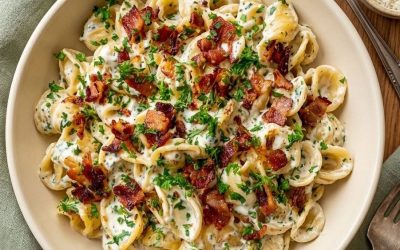 Deze Pasta Boursin met spekjes, ui en knoflook staat in 20 minuten op tafel