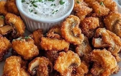 Deze krokante champignons met frisse ranchdip wil je deze zomer op tafel zetten