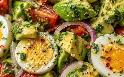 Frisse avocado-eisalade met cherrytomaatjes, munt en romige dressing